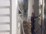 Self-portrait in distorting column
