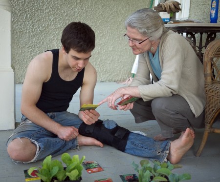 Mother and son consider garden choices.