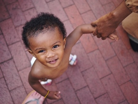 This was not the wandering eye of a toddler. This was the focused attention of an old soul. Maybe we've met before. | Click to view larger. A young man I met at the fountain in Silver Spring