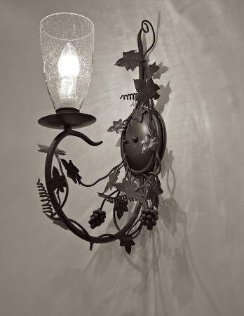 Cast iron wall sconce.