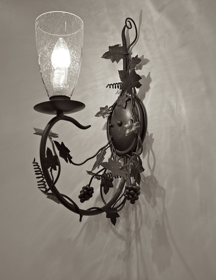 Cast iron wall sconce.