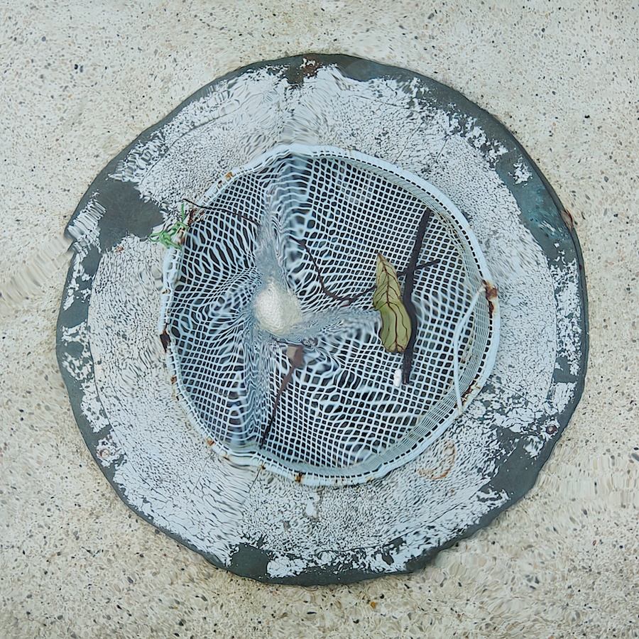 Fountain pool drain.