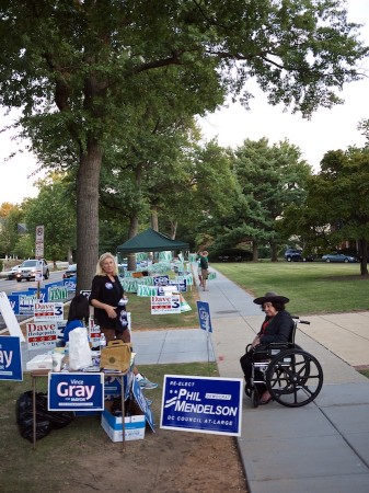 Campaign workers at a polling place, DC primary.