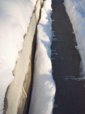 Snow-lined sidewalk.