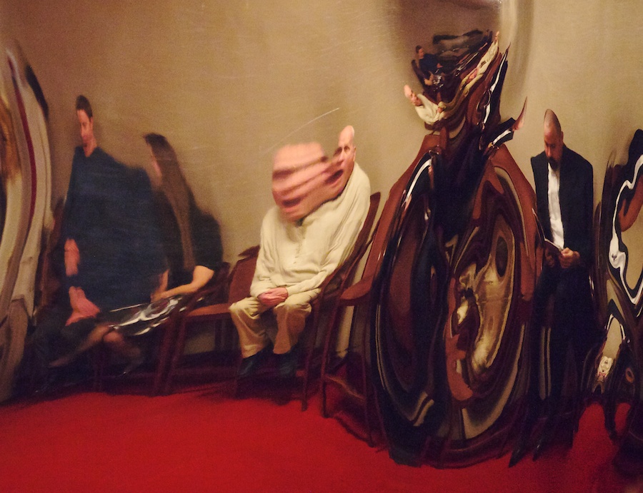 Distortions in a metal sculpture.