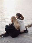 Two girls on the boardwalk.