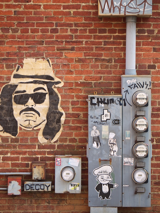 Tags and posters on utility boxes