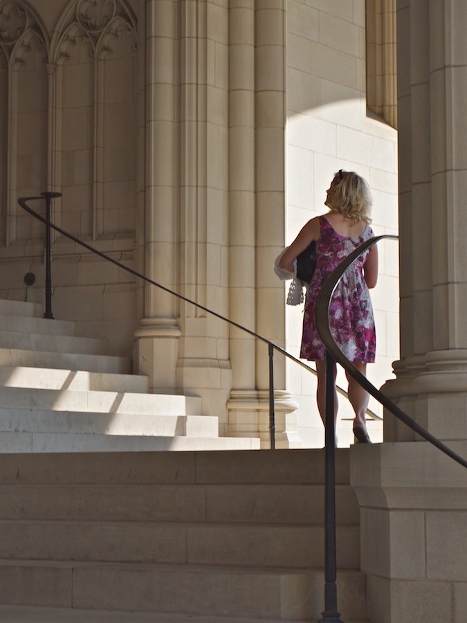 Woman admiring the West entrance to the National Cathedral, DC