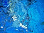 Blue water with bubbles.