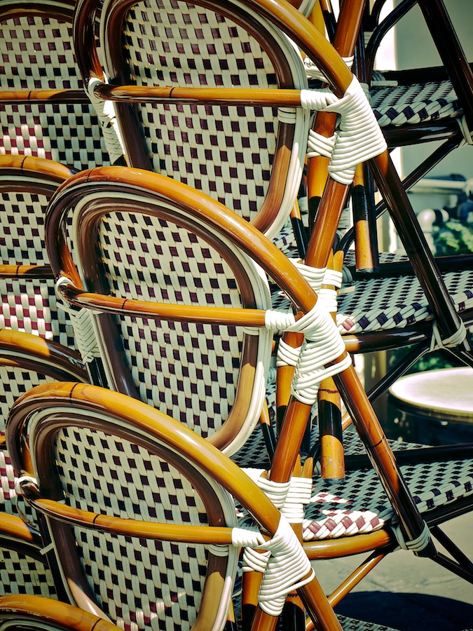 Stacked outdoor chairs.