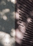 Pavement and grating.