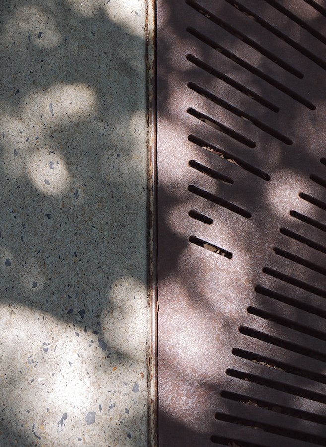 Pavement and grating.