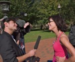 Margo Morado charms the media at the Stop the Machine/Occupy DC rally.