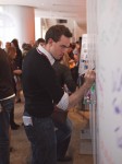 Man writing on comment wall, TEDxMidAtlantic