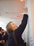 Woman writing on community wall at TEDxMidAtlantic 2011
