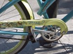 Wispy tattoo on bicycle.