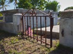 Low iron gate and small American flat, Key West Cemetery