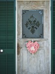 Front door with flower heart wreath in Old Town, Key West.