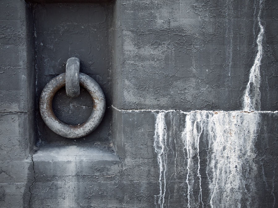 Metal ring affixed to wall.