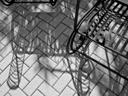 Metal chairs and shadows