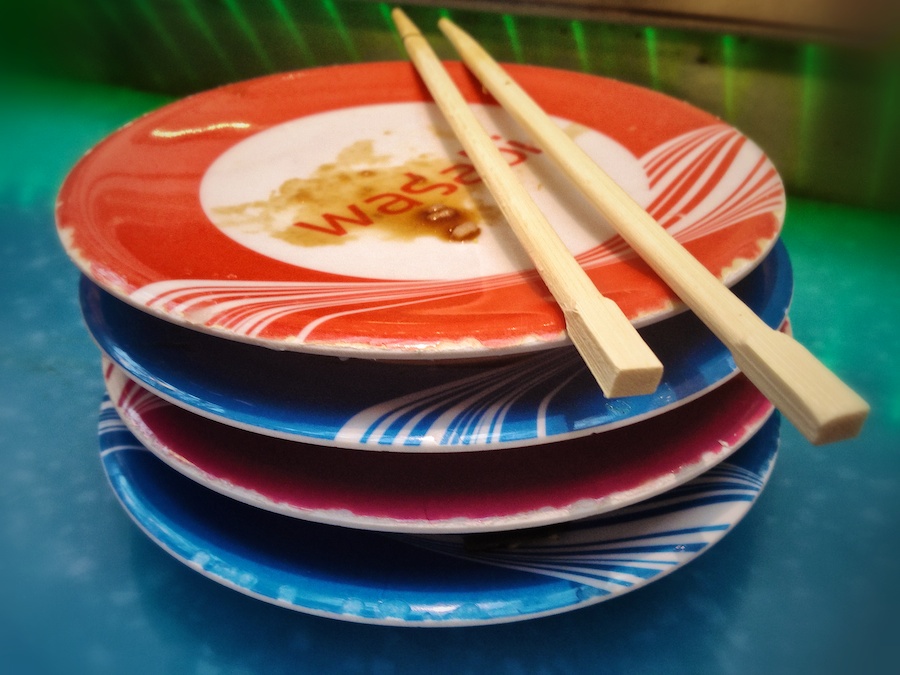 Stack of empty sushi plates, Wasabi Restaurant.