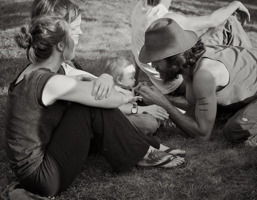 Man, baby, two women.